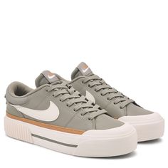 Elevate your style with the Women's Nike Court Legacy Lift Platform Sneaker. Synthetic leather upper in a platform sneaker style with a round toe. Lace up front. Subtly layered upper keeps it classic and easy to wear. Padded collar and tongue. Smooth lining with a padded insole. Platform midsole. Made from at least 20% recycled materials by weight. Rubber outsole delivers traction and durability. Womens Jeans And Sneakers Outfits, Platform Sneakers Outfit, Outfits 30s, Nike Court Legacy Lift, Jeans And Sneakers Outfit, Court Legacy Lift, Soft Woman, Fall Shopping List, Baby Boy Hairstyles