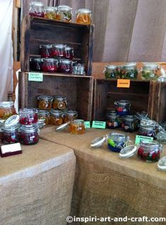 a table topped with lots of jars filled with different types of food and drink items