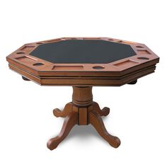 a small wooden table with a black top