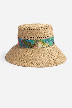 Crafted from 100% natural raffia, the Helena Bucket Hat offers additional protection from direct sun. Featuring a high crown encircled with a colorful fabric hatband, this hat is finished with a wide slanted brim to shield your eyes. Pair with colorful swimwear and a raffia beach bag for a polished poolside look. Women's Helena Bucket Hat by Johnny Was in Natural Raffia Beach Bag, Colorful Swimwear, Colorful Fabric, Boho Chic Outfits, Women's Blouses, Chic Outfit, Embroidered Jeans, Hat Band, Burning Man