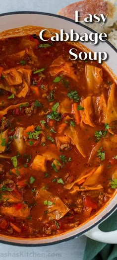 an easy cabbage soup in a white bowl with bread on the side and text overlay