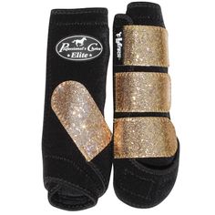 pair of black and gold shins with glitter on them