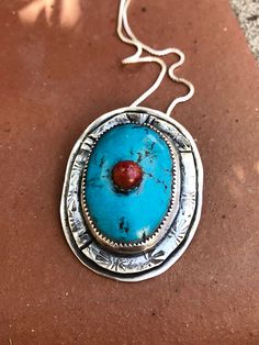 Beautiful stone on stone in turquoise and carnelian, set into stamped sterling silver. Southwestern Sterling Silver Turquoise Necklace With Large Stone, Turquoise Pendant, Moss Agate, Fort Worth, Sterling Silber, Amazing Jewelry, Pendant Necklaces, Silver Pendant, Jewelry Necklace Pendant