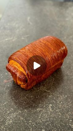 a wooden object sitting on top of a table