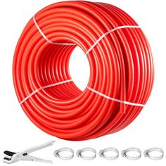 an orange hose and some tools on a white background