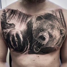 a man's chest with a bear tattoo on it, and an image of a bear in the woods