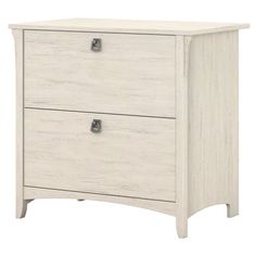 a white wooden dresser with two drawers