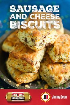 sausage and cheese biscuits are stacked on top of each other in a metal bowl with the title, sausage and cheese biscuits