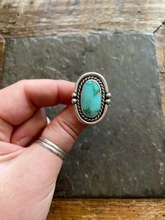 Handmade Royston Turquoise and sterling silver statement ring.  -Ring will fit US Size 6.5 American Southwestern Vintage style design. Beautiful striking minty green-blue  turquoise with warm golden tan-brown matrix. twisty rope like trim, with polished Rustic looking patina with high polish finish.  Double split style shank/band. Hand stamped Rising Sun and Arrow hallmark on backside. Turquoise stone is from the Royston mine in Nevada. 100% Sterling silver. --------------------- Every piece wil Southwestern Style Large Stone Turquoise Ring, Vintage Green Multi-stone Turquoise Ring, Vintage Sterling Silver Turquoise Ring With Large Stone, Vintage Turquoise Ring, Sterling Silver Multi-stone Turquoise Ring, Elegant Multi-stone Turquoise Ring In Sterling Silver, I'm Broke, Golden Tan, Minty Green