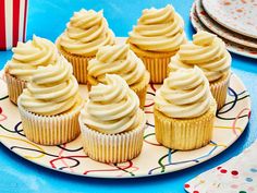 cupcakes on a plate with white frosting