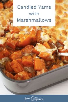 a casserole dish with marshmallows in it and text overlay that reads, candied yams with marshmallows