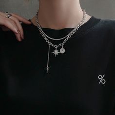 Unisex Gothic punk dark style to elevate your fashion vibes! Double layering silver chain necklace choker with crystal north star charm, cross drop pendant, and silver donut ring charm. Very chic and stylish for men and women, an eye-catching posh necklace to show your unique edgy taste. 💎 Features: ♥ Handcrafted ♥ Finish Tone: silver ♥ Side Stone: cubic zirconia ♥ Double layer, Adjustable closure ♥ Approximate Measurements: - Length: 18" with 2.5" adjustable ♥ Nickel/Lead Free, Hypoallergenic, Layering Chains, Edgy Necklace, Dark Necklace, Chain Necklace Women, Donut Ring, Punk Necklace, Star Choker, Necklace Gothic, Double Necklace