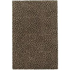 a brown and black animal print rug