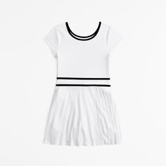 Our new short-sleeve active dress in our soft synthetic mixed fabric. Features a crew neckline, on-trend pleating details and shorts lining underneath. Active Dress, Pleated Mini Dress, Abercrombie Kids, Dress Girls, Dress Romper, Upper Body, Size 13, Crew Neckline, White Dress