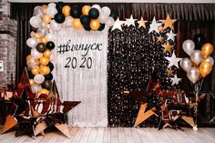 balloons and streamers decorate the entrance to a new year's eve party