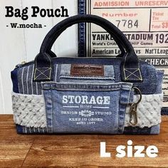 a purse made out of old jeans with the words storage on it and an image of a