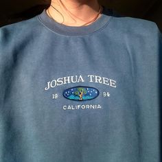 *SIZES ARE UNISEX* -I'd suggest your usual size for a more fitted look, or sizing up for a more relaxed fit. *these sweatshirts are extra comfy when oversized 🌲 "Joshua Tree California  Est 1994" embroidered on a comfy cute vintage-style crewneck. A sturdy and warm sweatshirt bound to keep you warm in the colder months. A pre-shrunk, classic fit sweater that's made with air-jet spun yarn for a soft feel and reduced pilling. Your new favorite sweatshirt! * 50% cotton, 50% polyester * Pre-shrunk Casual Sweatshirt With Custom Embroidery Relaxed Fit, Casual Relaxed Fit Sweatshirt With Custom Embroidery, Vintage National Park, Joshua Tree California, Unique Nature, Natural Gifts, California State, Joshua Tree, Look Plus