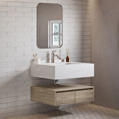 a bathroom with a sink, mirror and towel rack in it's corner next to a white brick wall