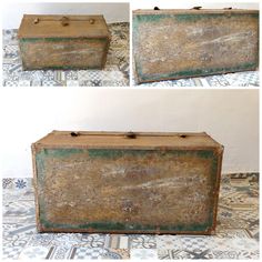 an old wooden box sitting on top of a tiled floor