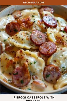 a bowl filled with pasta covered in cheese and pepperoni toppings, on top of a wooden table