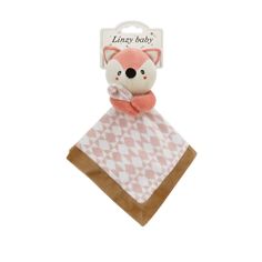 a pink and white animal on top of a napkin