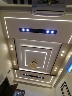 an overhead view of a living room with lights on the ceiling