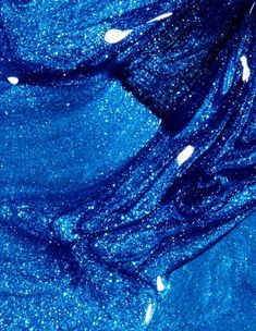 blue glitter fabric with white dots on it