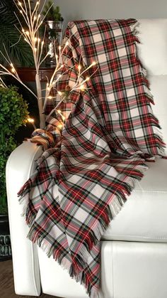 Add classic festive color to your sofa with this Dress Stewart tartan throw.  Toss the throw across your rocking chair for easy access when you settle in with a good book or simply want to watch the fireplace. This can even be used as an accent Christmas table cloth.  The perfect co worker Holiday gift that they will use year after year. This  polyviscose tartan throw is a single layer and comes in three sizes with an approximately 2 inch fringe on all four edges.  If you would like a different Bedroom Things, Plaid Sofa, Air Force Families, Tartan Throws, Blanket Plaid, Royal Stewart Tartan, Red Buffalo Check, Season Decor, Weaving Looms