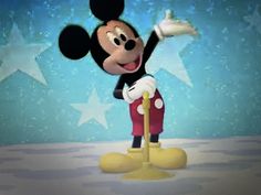 the mickey mouse character is waving to someone in front of stars and a blue background