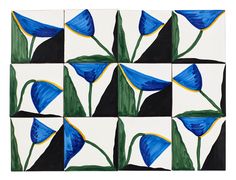 blue flowers are painted on white tiles with green leaves and black squares in the background