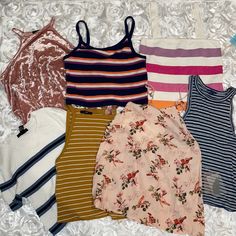 7 Cute Spring/Summer Top Bundle Include This With 2 Items In My Closet For Free Shipping And The Seller Discount!! Striped/Floral Size: Top Left-Xs Middle-S Right-L (Has Slight Stain But Nwt) Bottom Left-S Middle Left-S Middle Right-Xs (Nwt) Right-Xs All From Forever 21 But Bottom Right Is Aropostale Each Cost About $15 Originally If You Just Want One Item From The Bundle, Let Me Know! Make An Offer!! Fitted Summer Tank Top For Day Out, Casual Stretch Tank Top For Summer, Casual Crop Top Tank For Day Out, Casual Stretch Tank Top For Spring, Stretch Tank Top For Summer Day Out, Trendy Multicolor Summer Tops, Spring Stretch Tank Top, Trendy White Tank Top For Summer, Casual Cami Tank Top For Beach Season