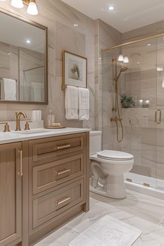 a bathroom with a toilet, sink and shower