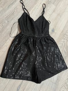 Super chic sequin black romper with a tie back from my boutique KaliJace. All sizes available. New with tags. Sequin Backless Jumpsuits And Rompers For Party Season, Sequin Backless Jumpsuits And Rompers For Night Out, Chic Party Jumpsuits And Rompers With Sequins, Chic Sequined Summer Jumpsuits And Rompers, Chic Sequined Jumpsuits And Rompers For Party, Chic Sequined Jumpsuits And Rompers For Summer, Sequin Sleeveless Jumpsuits And Rompers For Date Night, Black Sequined Jumpsuits And Rompers For Cocktail, Sleeveless Sequin Jumpsuits And Rompers For Date Night