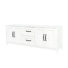 a white cabinet with black handles and drawers