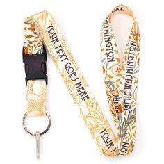 a lanyard with a keychain that has an image of flowers on it