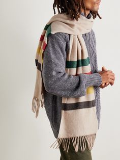 Pendleton’s scarf is knitted with its vivid ‘Glacier’ motif, which dates back to the early 1900s – the bold stripes were originally markers of its value. This cosy style is spun from pure wool, appliquéd with a logo patch and finished with soft fringing. Mens Scarf Fashion, Cosy Style, Wool Scarves, Abstract Scarf, Mens Scarf, Scarf For Men, Gift Inspo, Scarf Fashion, Bold Stripes