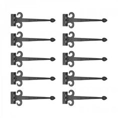 six pairs of black iron hooks on a white background