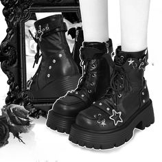 Step into a world of whimsical charm with these platform ankle boots, perfect for those who adore a blend of edgy and cute styles. Featuring a lace-up design, these boots are adorned with an enchanting adjustable strap at the ankle, complete with star-shaped buckles and playful bat wing embellishments. The side zipper ensures easy wearability, while the studded accents add a touch of rebellious flair.Ideal for anyone looking to make a bold fashion statement while embracing their inner kawaii spi Star Platform Boots, Brianne Tju, Shoe References, Emo Shoes, Kitty Cheshire, Goth Platforms, Goth Boots, Gothic Boots, Pretty Shoes Sneakers