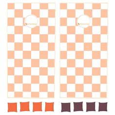 a checkerboard board with orange and brown squares on it, as well as two pillows