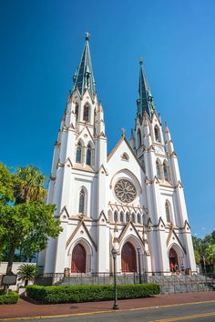 a large white church with two towers on each side