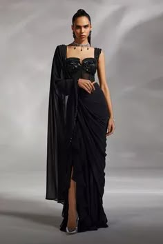 Shop for Divya Aggarwal Black Satin Hertha Pre-draped Saree With Corset Blouse for Women Online at Aza Fashions Drape Saree Designer 2023, Corset Sari Blouses, Black Corset Blouse, Sweetheart Neckline Blouse Pattern, Black Cocktail Saree, Corset Sari, Corset Saree Blouse Design, Black Drape Saree, Corset Outfit Indian