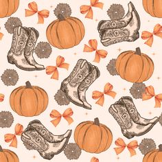 an orange and white pattern with boots, pumpkins and flowers on it's side