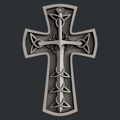 a metal cross with an intricate design on the front and back side, against a black background