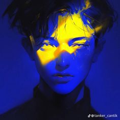 a man with blue and yellow light on his face