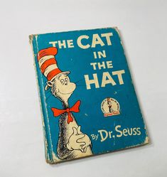 the cat in the hat by dr seuss book with blue cover and red bow tie