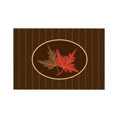 a place mat with an image of two leaves in the center on a brown striped background