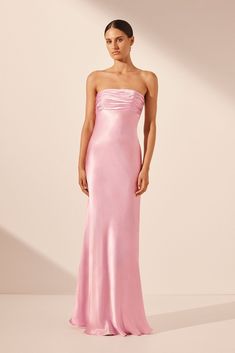 Formal Pink Silk Strapless Dress, Elegant Pink Silk Strapless Dress, Chic Pink Silk Strapless Dress, Pink Fitted Silk Strapless Dress, Silk Prom Dress With Straight Neckline, Pink Maxi Dress With Straight Neckline For Evening, Feminine Strapless Maxi Dress For Formal Occasions, Pink Silk Strapless Dress For Cocktail, Strapless Silk Maxi Dress With Ruched Details