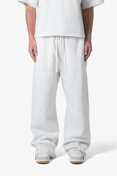 the Washed Ultra Baggy Sweatpants are designed with a baggy fit throughout, featuring an elasticized self waist, tonal cotton drawstrings, standard hem at the leg opening, and finished in both a washed and brushed fleece fabric. details baggy fit 100% cotton, 360 gsm model is 6’1, 140 lbs and wears a size medium note: this fit is intentionally baggy in waist and fit, for a more relaxed fit we recommend sizing down Affordable Baggy Sweatpants, Baggy White Sweatpants, White Baggy Sweatpants, Pants Essentials, Baggy Grey Sweatpants, Baggy Sweatpants Outfit, Baggy Sweats, Oversized Joggers, Oversized Sweatpants