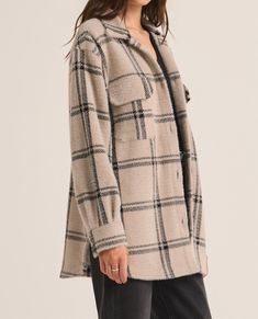 Get cozy in our Plaid Tucker Jacket with a relaxed fit and longline length. This playful piece features a collared neckline, button front, and chest pockets with flaps for added style. Made with a sweater knit blend of 57% nylon and 43% polyester for maximum comfort. Perfect for staying warm and stylish on chilly days! Maxi Jumpsuit, Statement Jacket, Big Sweaters, Athleisure Tops, Silk Bottoms, Plaid Sweater, Leather Denim, Oversized Jacket, Plaid Jacket