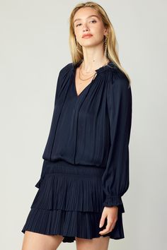 This tie-neck mini dress is the perfect choice for occasions ahead. full length sleeves frame the languid drape of the bodice, while the twirl-ready tiered skirt adds plenty of movement. •On average, customers say it fits large •Split neckline with smocking •Adjustable tie detail •Ruffle trim •Elastic drop waist •Pleated tiered skirt •Relaxed fit DIMENSIONS •Standard: 34.75" L Item number 1690963100% Polyester Hand wash cold Imported Chic Long Sleeve Mini Dress With Pleated Hem, Chic Navy Dress For Fall, Chic Navy Dresses For Fall, Chic Navy Long Sleeve Mini Dress, Pleated Mini Dress, Rayon Dress, Tiered Skirt, Tie Neck, Waist Dress